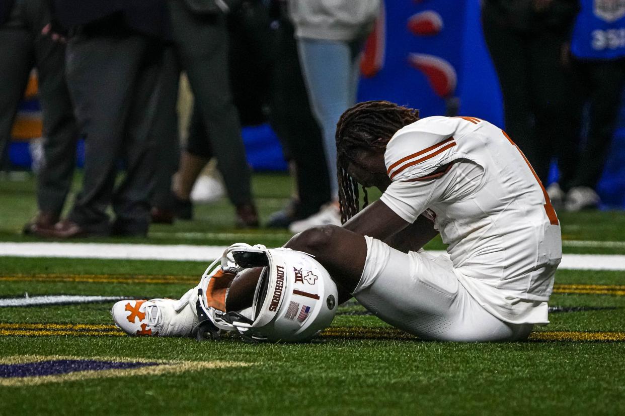 Texas Longhorns wide receiver Xavier Worthy (1) sits in the endzone after the 31-37 loss to the Washington Huskies in the Sugar Bowl College Football Playoff semifinals game at the Caesars Superdome on Monday, Jan. 1, 2024 in New Orleans, Louisiana.