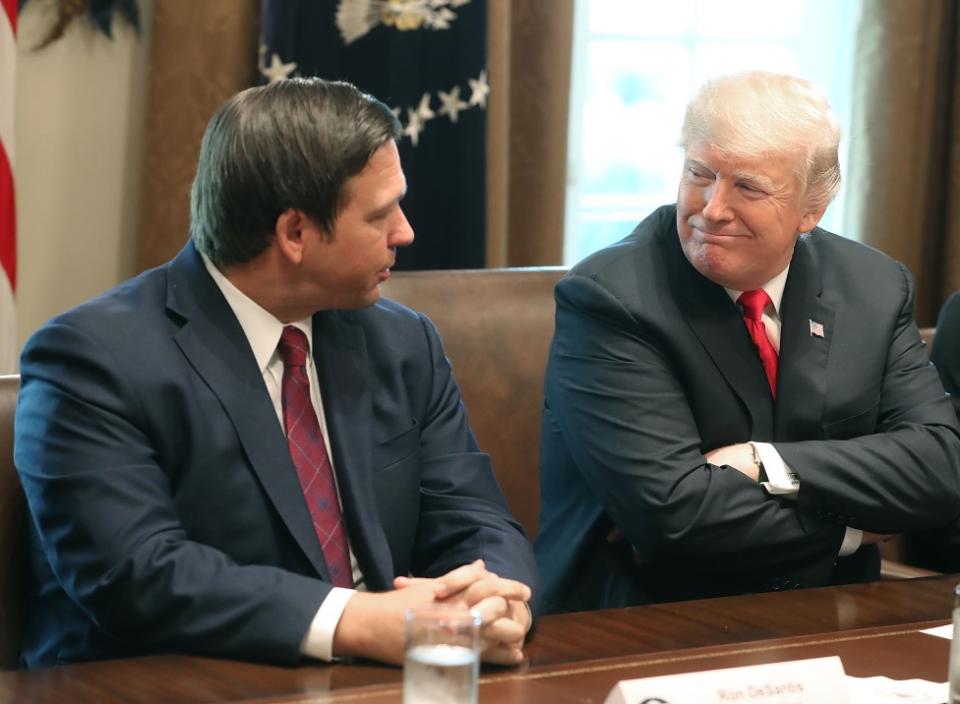 Ron DeSantis y Donald Trump en 2018