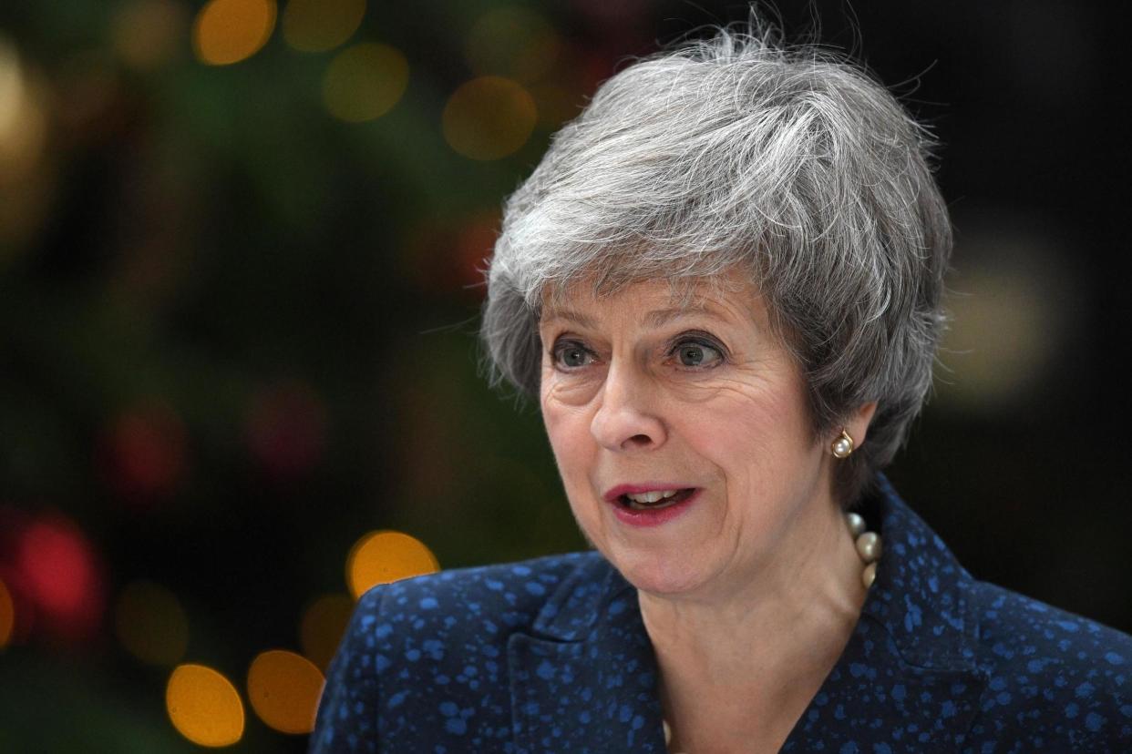 Mrs May outside of Downing Street earlier today: Getty Images