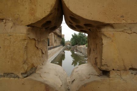 Waste dumped in the river near one of the ancient historic houses dated back to the time of Ottomans in the old downtown of Basra, Iraq May 9, 2018. REUTERS/Essam al-Sudani