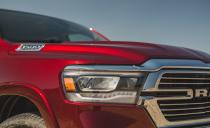 <p>Our test truck had numerous options including red pearl paint ($100), front leather buckets and a large console ($895), painted and polished 20-inch aluminum wheels ($1295), the Laramie Level 1 equipment group ($1695), and more.</p>