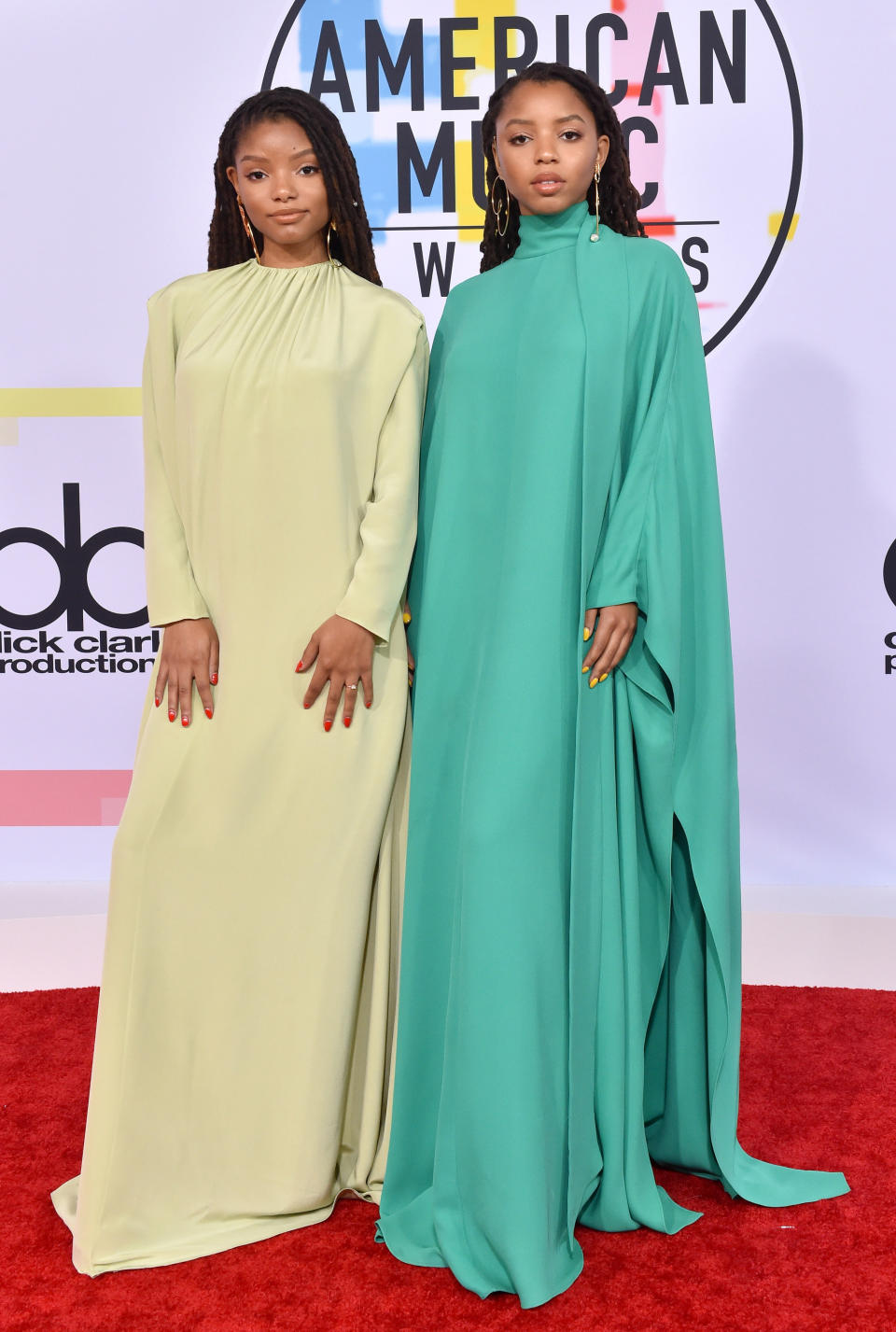 The singers wear coordinating Valentino gowns at the American Music Awards.&nbsp;