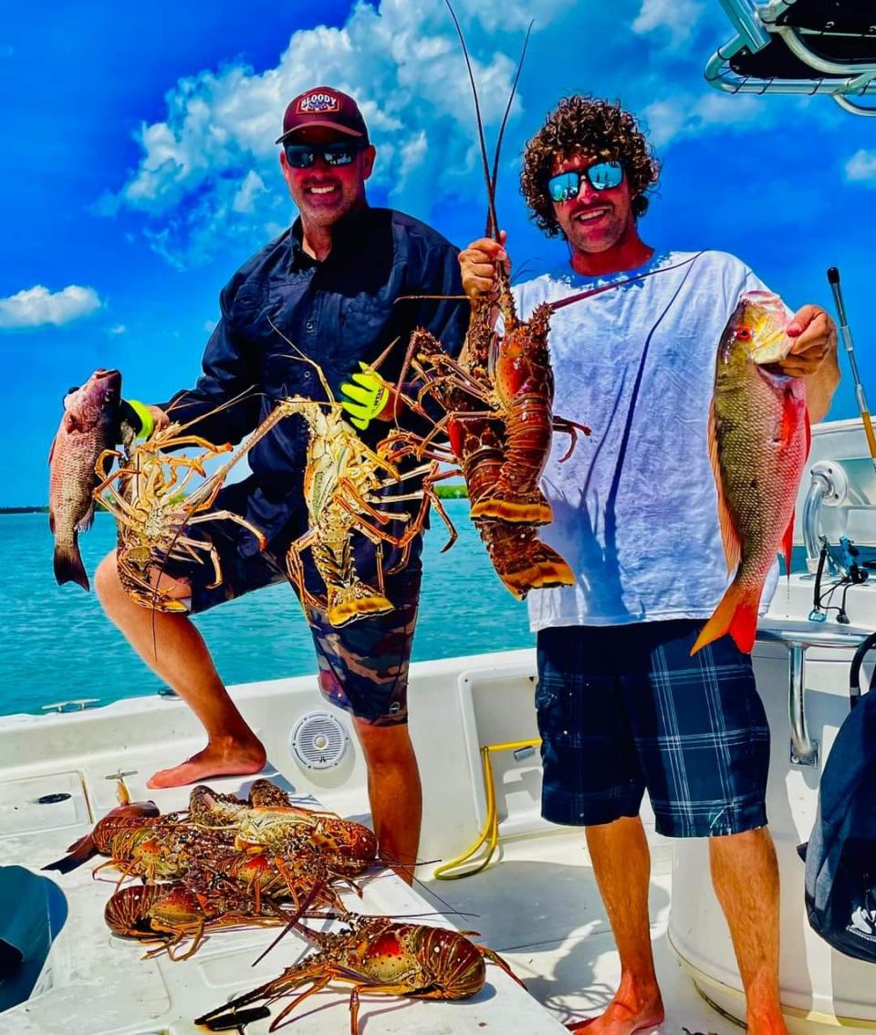 The Couture brothers from Melbourne show off their catch from August 15, 2022 near Sebastian. Clear water provided great visibility for divers.