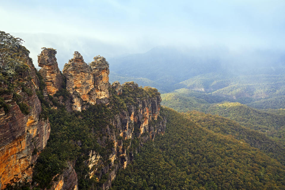 View from Echo Point lookout, looking down at Jamison Valley with Mount Solitary (Korowal) on the horizon in cloud