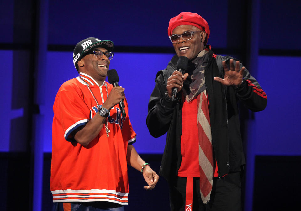 Host Samuel L. Jackson, right, and Spike Lee appear on stage at the BET Awards on Sunday, July 1, 2012, in Los Angeles. (Photo by Matt Sayles/Invision/AP)