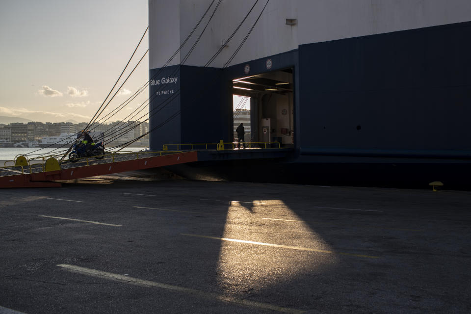 A ferry is docked at the port of Piraeus, near Athens during a 24-hour strike on Thursday, Nov. 26, 2020. Ferries to the islands were halted and the Athens metro system and tram were shut for Thursday's strike, although buses continued to run in the capital. (AP Photo/Petros Giannakouris)
