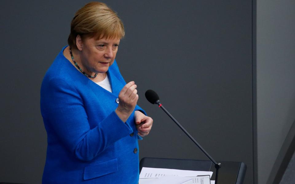 'In our country, if you come from Great Britain you have to go into quarantine – and that's not the case in every European country, and that's what I would like to see,' Mrs Merkel said on Wednesday - Michele Tantussi/Reuters