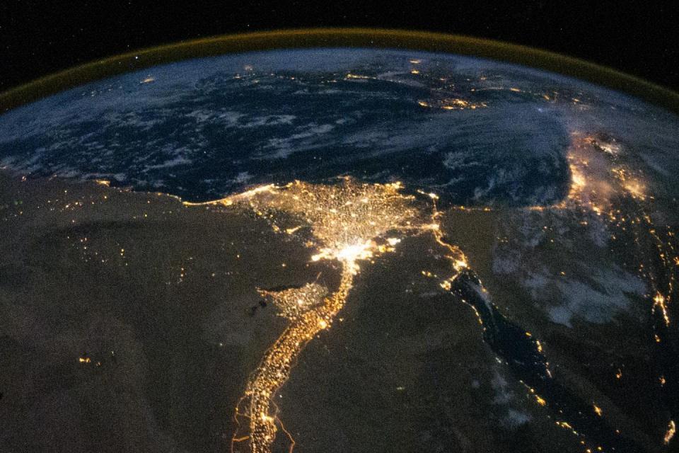 An aerial view of the Nile River delta at night from the International Space Station. Metropolitan Cairo is the bright area at the base of the fan. <a href="https://www.nasa.gov/sites/default/files/images/537063main_nileatnight_full.jpg" rel="nofollow noopener" target="_blank" data-ylk="slk:NASA;elm:context_link;itc:0;sec:content-canvas" class="link ">NASA</a>