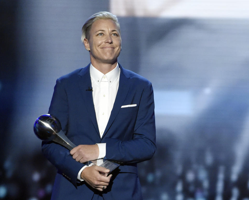 FILE - In this July 13, 2016, file photo, former U.S. soccer player Abby Wambach accepts an icon award at the ESPY Awards at the Microsoft Theater in Los Angeles. The U.S. women's national team has not only been wildly successful on the field, the players have also been unabashedly outspoken, using their platform to advocate for equal rights for themselves and others. (Photo by Chris Pizzello/Invision/AP, File)