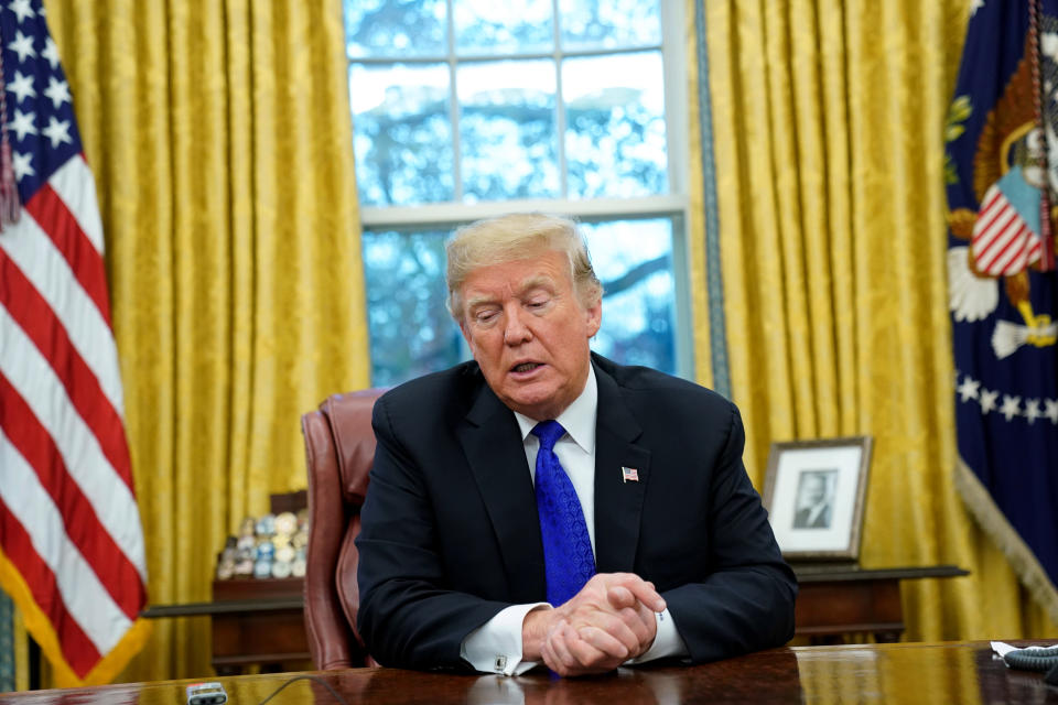 U.S. President Donald Trump sits for an exclusive interview with Reuters journalists in the Oval Office at the White House in Washington, U.S. December 11, 2018. REUTERS/Jonathan Ernst