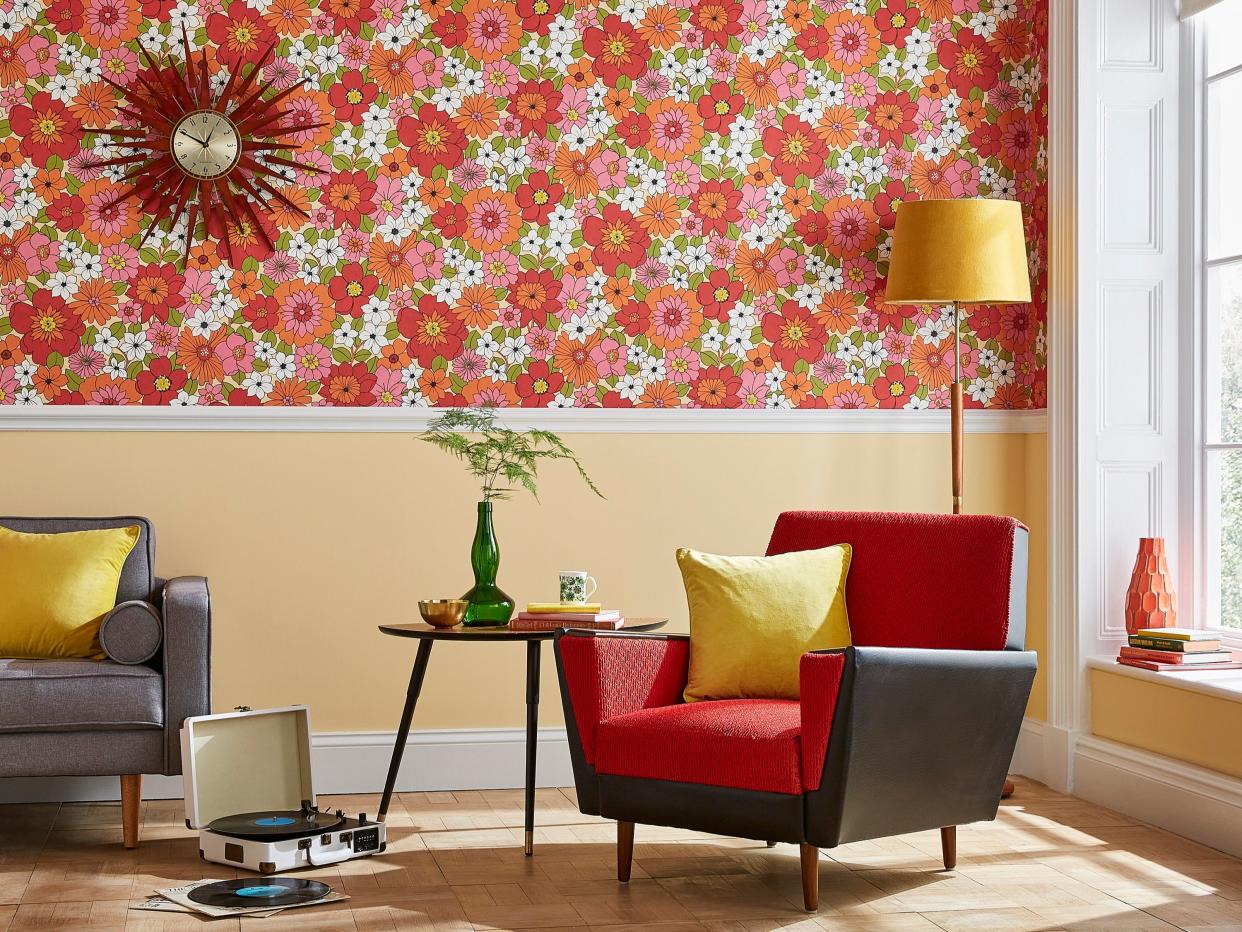 <p>1960s Flower Power wallpaper, costing £65 per roll </p> (Graham & Brown)