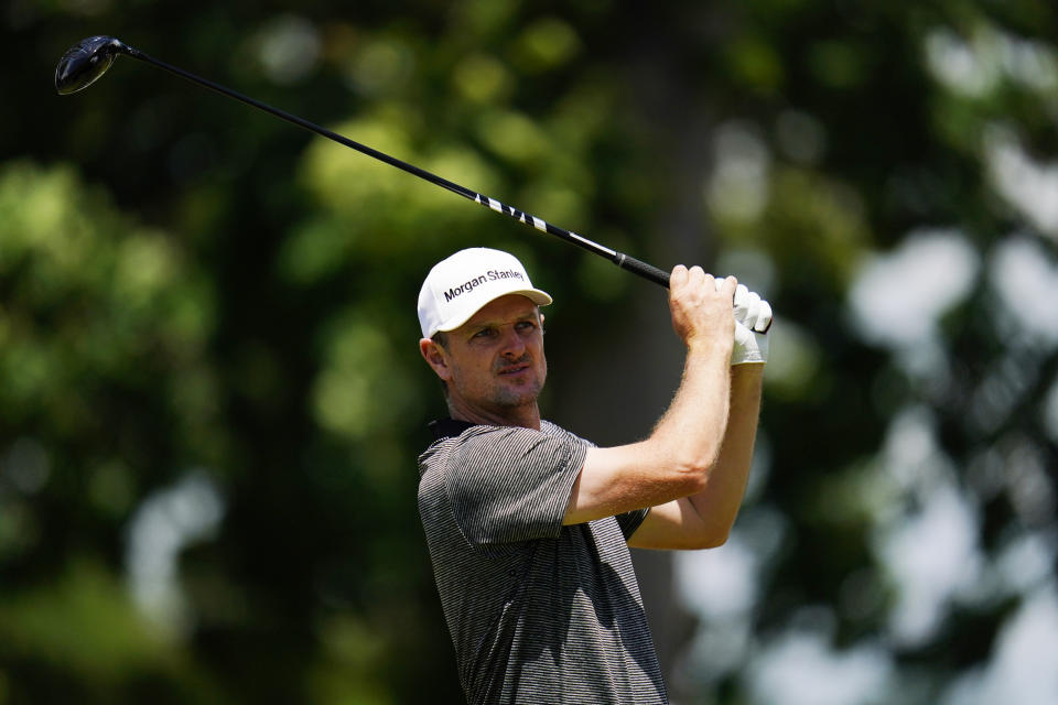 Justin Rose, of England, hits on the fourth hole during a practice round for the U.S. Open golf tournament at The Country Club, Wednesday, June 15, 2022, in Brookline, Mass. (AP Photo/Julio Cortez)