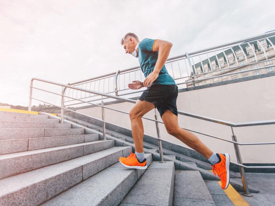 man running jogging stairs exercise