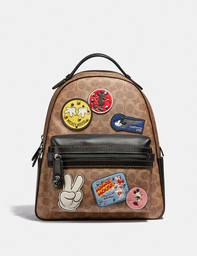 Disney X Coach Campus Backpack In Signature Canvas With Patches. Image via Coach.