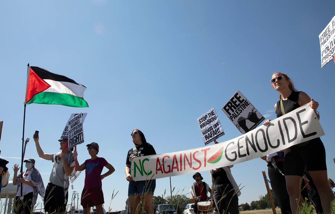 Pro-Palestinian demonstrators protest outside of the North Carolina State Fairgrounds in Raleigh before President Joe Biden’s campaign rally.