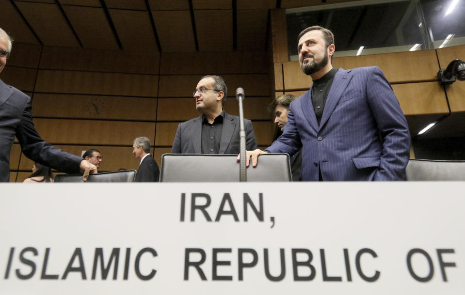 Iran's Ambassador to the International Atomic Energy Agency, IAEA, Gharib Abadi, right, waits for the start of the IAEA board of governors meeting at the International Center in Vienna, Austria, Monday, Sept. 9, 2019. (AP Photo/Ronald Zak)
