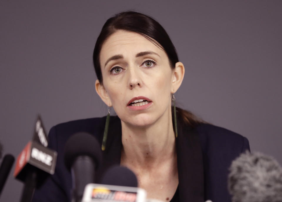 FILE - In this Dec. 10, 2019, file photo, New Zealand Prime Minister Jacinda Ardern holds a press conference in Whakatane, New Zealand. Ardern on Tuesday, Aug. 11, 2020, says authorities have found four cases of the coronavirus in one Auckland household from an unknown source, the first cases of local transmission in the country in 102 days. (AP Photo/Mark Baker, File)