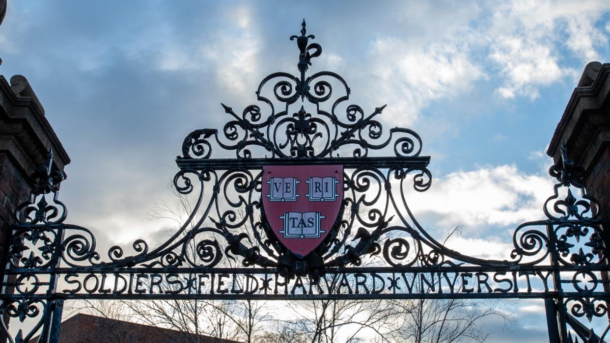  Harvard University's 'Veritas' shield on a pair of gates. 