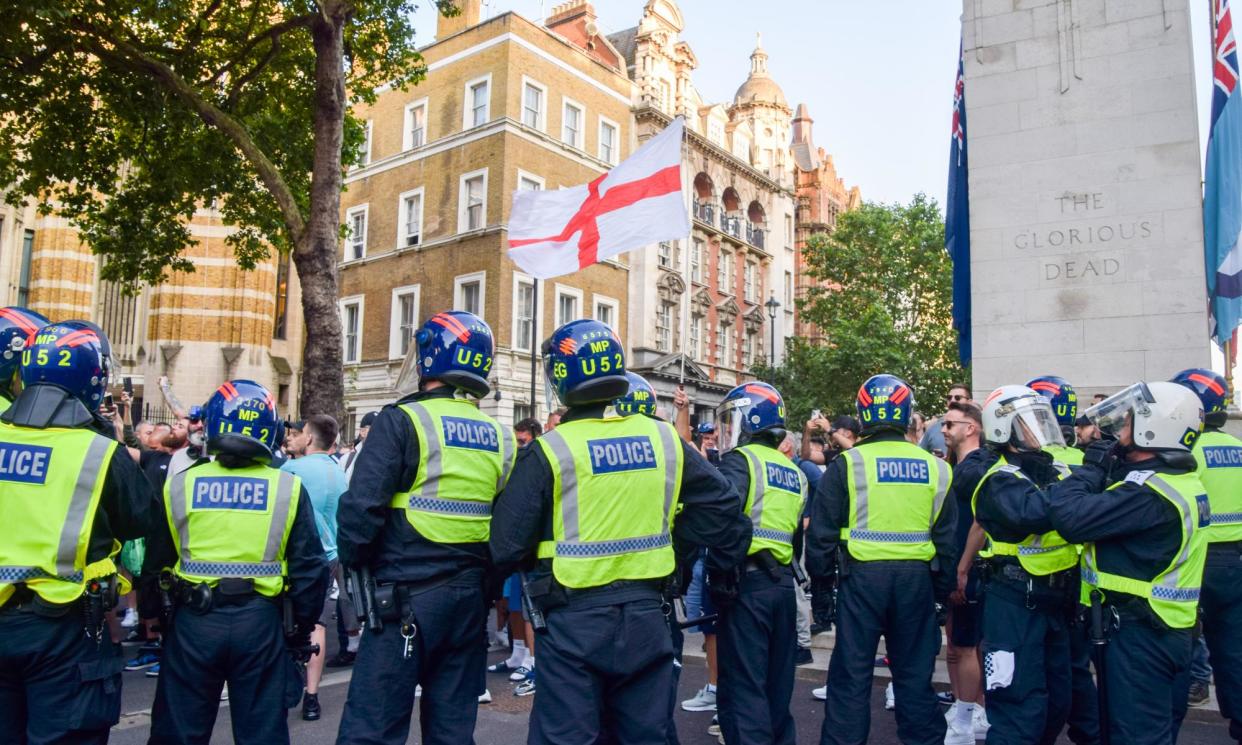 <span>Police in riot gear face far-right protesters in Whitehall in London on Wednesday.</span><span>Photograph: Vuk Valcic/Zuma Press Wire/Rex/Shutterstock</span>