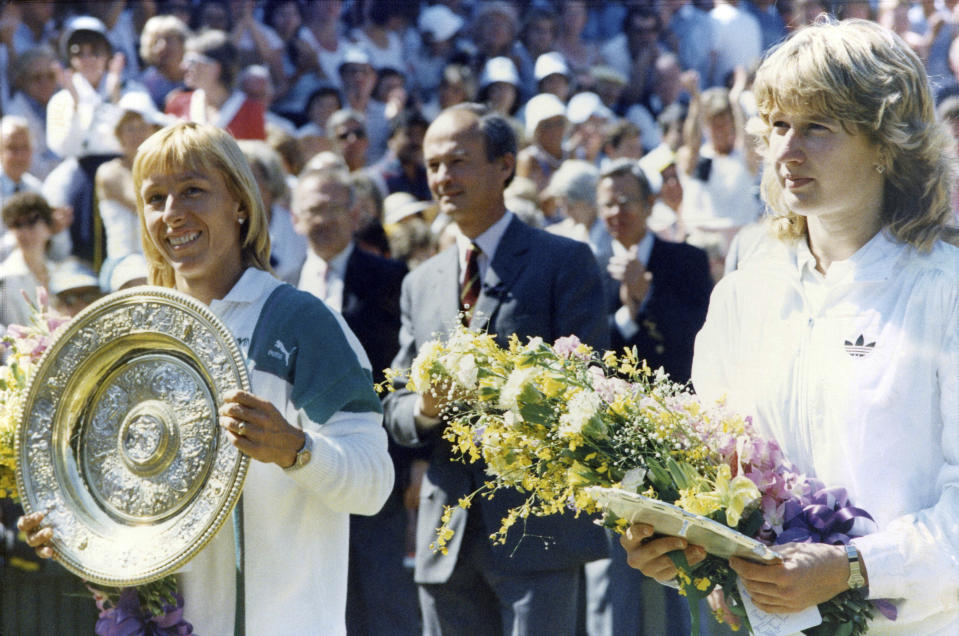 FILE - In this July 4, 1987, file photo, Martina Navratilova, left, and Steffi Graf pose on Center court after the women's singles final at Wimbledon. Navratilova won 7-5, 6-4. (AP Photo/Robert Dear, FIle)