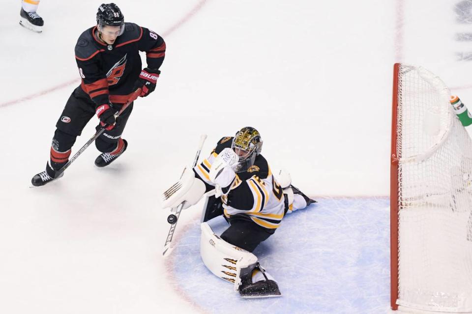 Aug 17, 2020; Toronto, Ontario, CAN; Carolina Hurricanes center Martin Necas (88) skates as Boston Bruins goaltender Jaroslav Halak (41) makes a save in net in the second period in game four of the first round of the 2020 Stanley Cup Playoffs at Scotiabank Arena. Mandatory Credit: Dan Hamilton-USA TODAY Sports