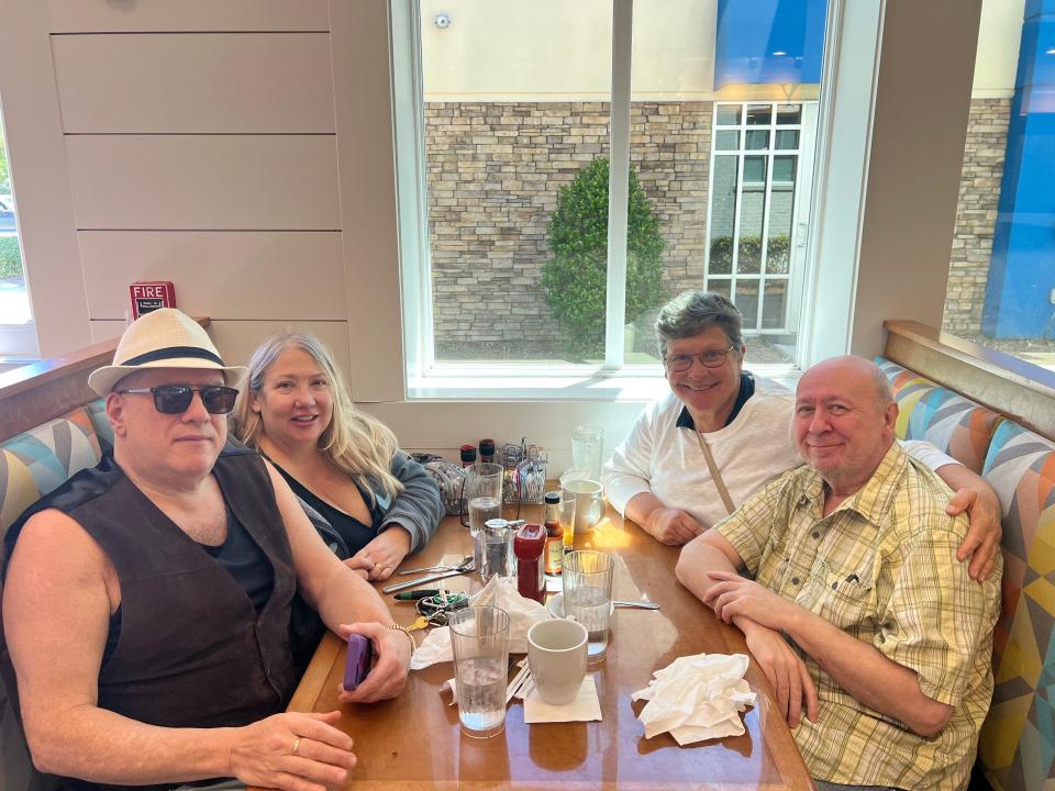 From left, Nick Ripostella and Ginger Scott-Slater dine with Betty Ann Cretara and Jez Allen. Allen is currently fostering the late Brook Heimbaugh's dogs.