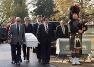 Philadelphia Police Officials act as pallbearers, and carry the coffin holding "America's Unknown Child" to his gravesite before the start of graveside services at Ivy Hill Cemetary on Wednesday, Nov. 11th, 1998 in Philadelphia. The boy's body was found almost 40 years ago in a box. The identity of the boy still has not been determined. (AP Photo/William Thomas Cain)