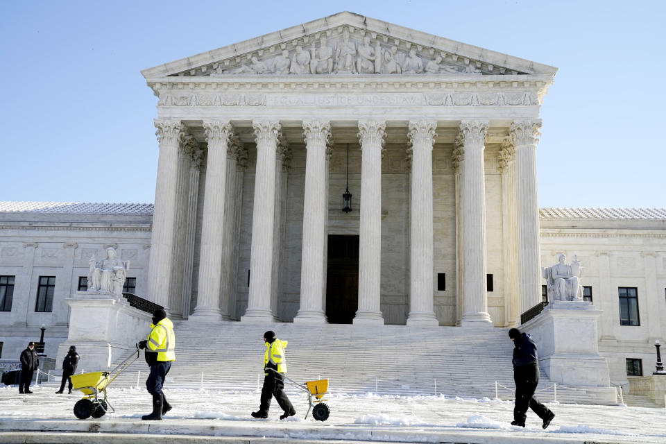 FILE - The Supreme Court shown Friday, Jan. 7, 2022, in Washington. The Supreme Court has stopped the Biden administration from enforcing a requirement that employees at large businesses be vaccinated against COVID-19 or undergo weekly testing and wear a mask on the job. The court's order Thursday during a spike in coronavirus cases deals a blow to the administration's efforts to boost the vaccination rate among Americans. (AP Photo/Evan Vucci, File)