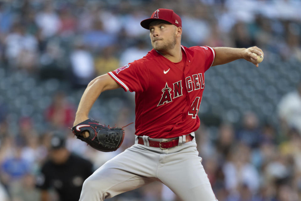 Los Angeles Angels starter Reid Detmers delivers a pitch during the first inning of the second game of a baseball doubleheader against the Seattle Mariners, Saturday, Aug. 6, 2022, in Seattle. (AP Photo/Stephen Brashear)