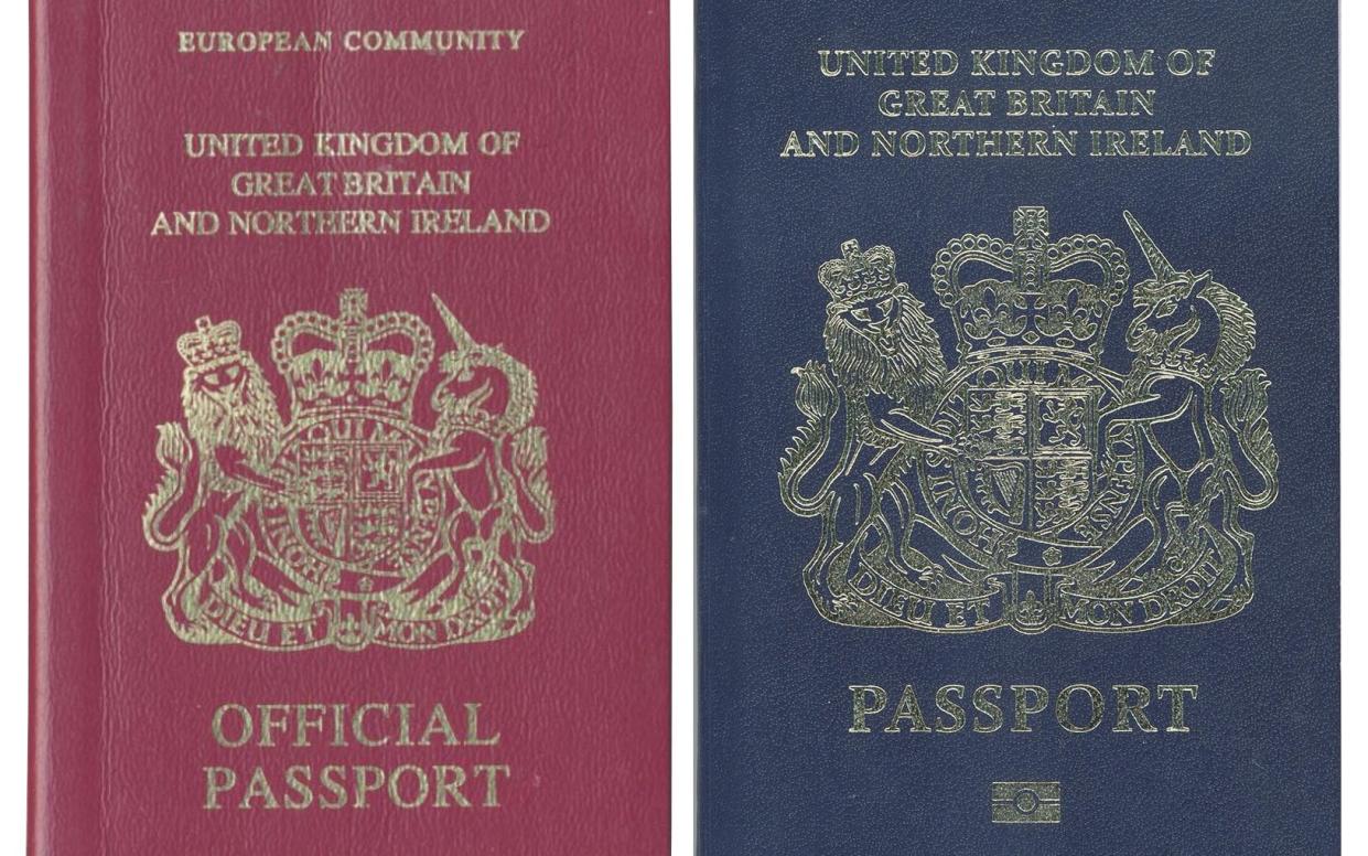 The iconic blue passport is set to make a return  - AFP