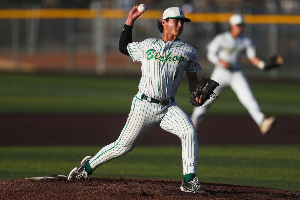 Bishop's Brian Buchanan (4) delivers a pitch in a quarterfinal playoff game against Banquete at Cabaniss Field on May 18. The Badgers won by the mercy rule 10-0 in the fifth inning.