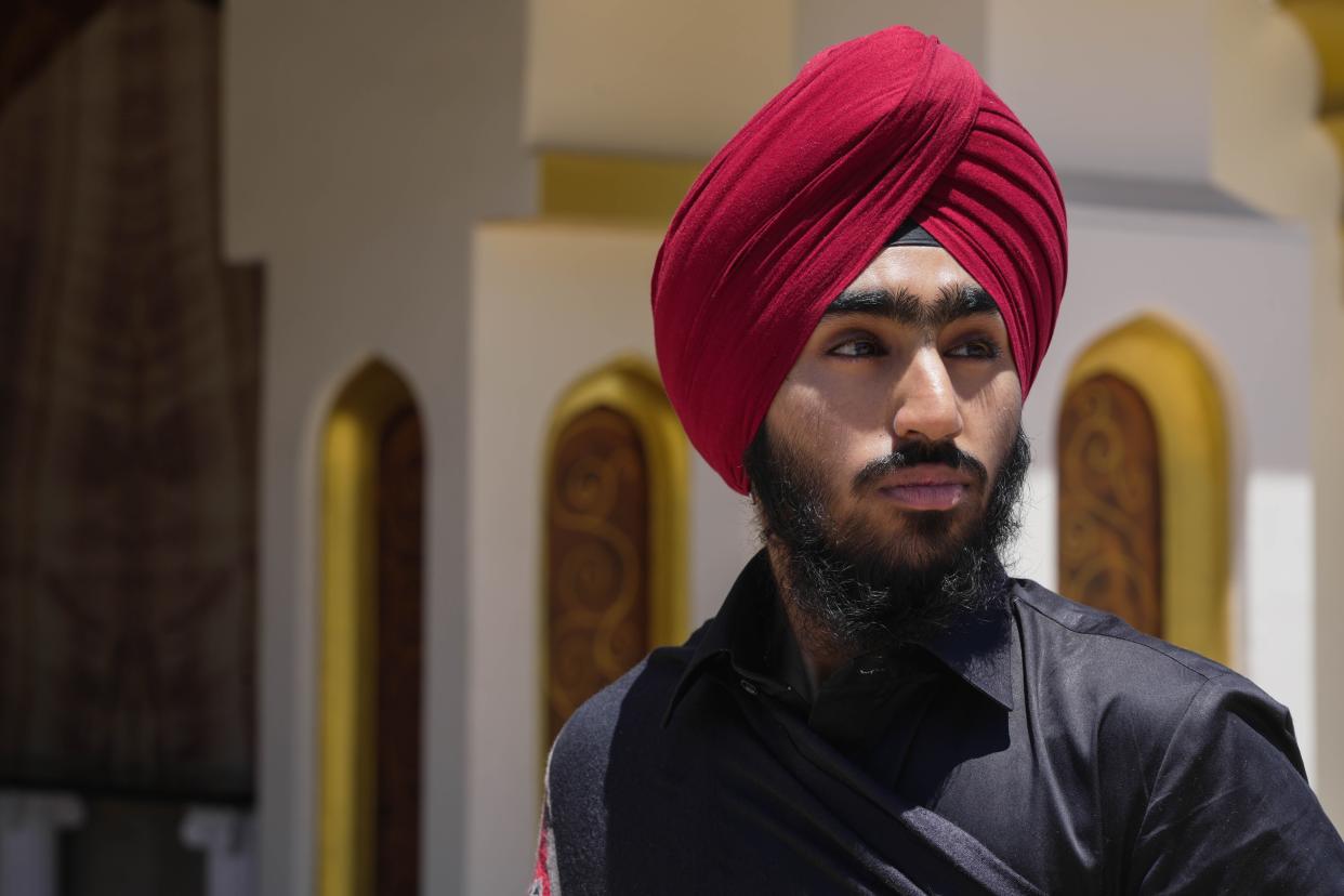 Makheer Singh teaches other students how to master the taus and dilruba, two instruments to help connect them to their Sikh faith. He performed at the Shri Guru Singh Sabha in Walnut, California this summer as part of a July 4 Kirtan Darbar event.