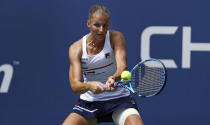 Karolina Pliskova, of the Czech Republic, returns to Johanna Konta, of the United Kingdom, during round four of the US Open tennis championships Sunday, Sept. 1, 2019, in New York. (AP Photo/Kevin Hagen)