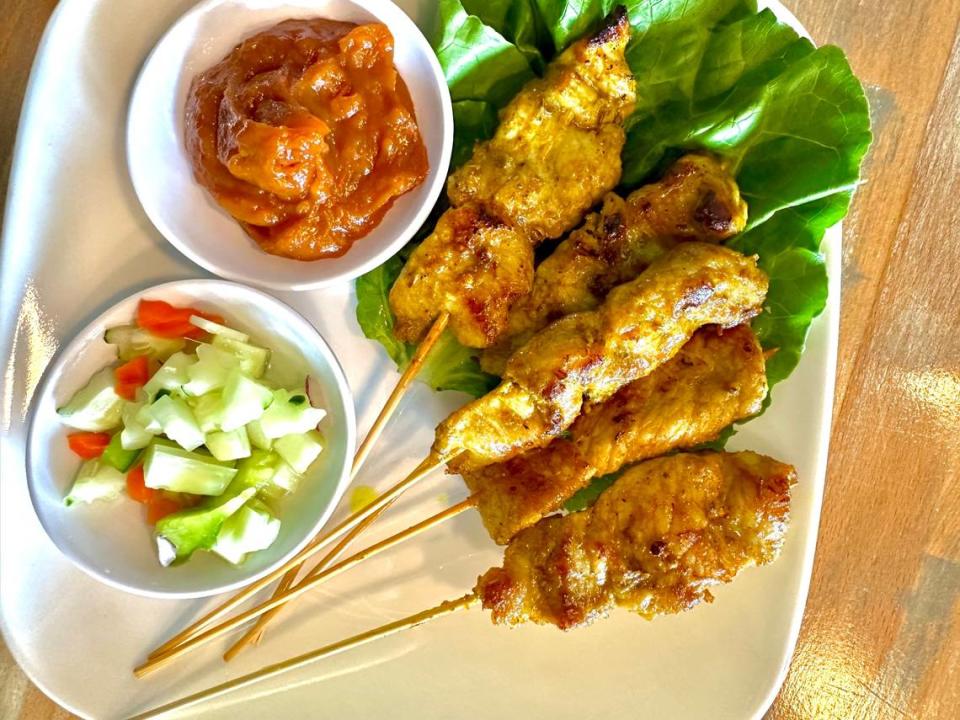 Satay is offered in skewers of pork or chicken marinated in coconut milk, herbs and curry powder at Charm Thai, 4511 Manatee Ave. W., Bradenton.