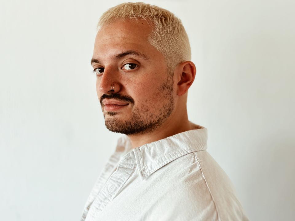 Christian Grotewold closeup of writer's face with bleached hair