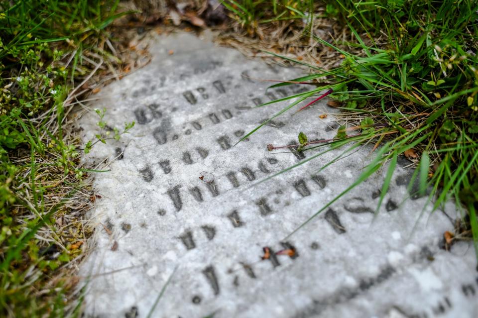 One of two grave markers planned to be restored at the Beck family burial plot on Tuesday, May 23, 2023, at Mt. Hope Cemetery in Lansing.