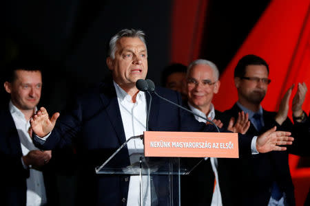 Hungarian Prime Minister Viktor Orban addresses the supporters after the announcement of the partial results of parliamentary election in Budapest, Hungary, April 8, 2018.REUTERS/Leonhard Foeger