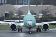 A Boeing 737 Max airplane being built for Norwegian Air International turns as it taxis for take off for a test flight, Wednesday, Dec. 11, 2019, at Renton Municipal Airport in Renton, Wash. The chairman of the House Transportation Committee said Wednesday that an FAA analysis of the 737 Max performed after a fatal crash in 2018 predicted "as many as 15 future fatal crashes within the life of the fleet" during opening remarks at the committee's fifth hearing on the Boeing 737 Max. (AP Photo/Ted S. Warren)