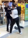 This is the shocking moment a security guard and a shopper viciously brawled outside a Selfridges following a row about entering the store with rollerblades. The smartly-dressed security worker traded punches with the irate customer after violence erupted at Birmingham's Bull Ring shopping centre on Saturday (26/9). The pair can be seen adopting boxing stances before exchanging blows in front of stunned shoppers at the entrance of the posh department store. In the footage, obtained by website Birmz Is Grime, one man can be heard saying "chill man" before the video ends with two burly men continuing to swing punches.