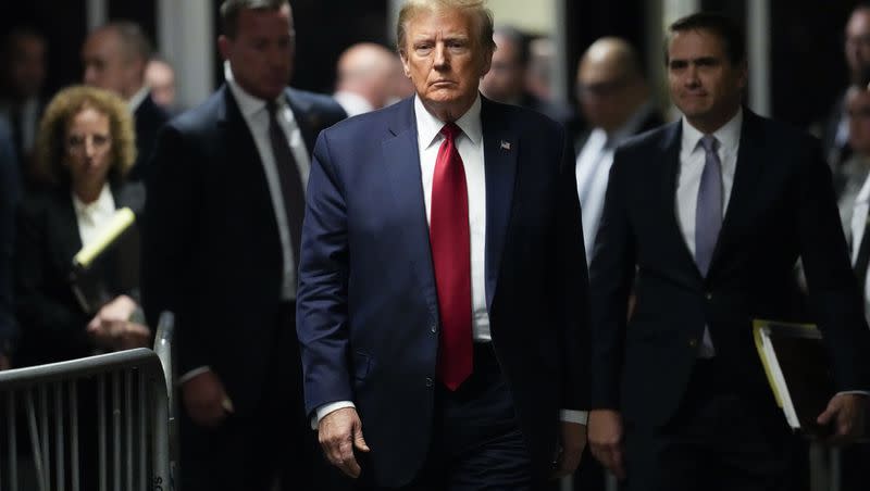 Former President Donald Trump leaves Manhattan criminal court on Thursday, Feb. 15, 2024, in New York. A New York judge says Trump’s hush-money trial will go ahead as scheduled with jury selection starting on March 25.