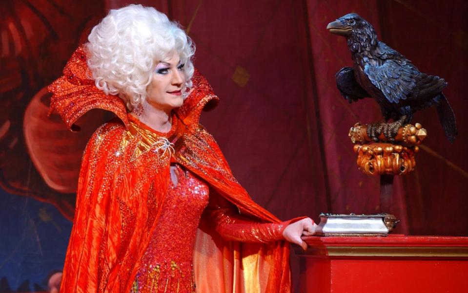 Paul O'Grady performing as the Wicked Queen in Snow White & The Seven Dwarfs at the Victoria Palace Theatre in London in 2004 - Yui Mok/PA