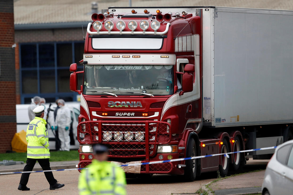 Police move the lorry container where bodies were discovered, in Grays, Essex, Britain October 23, 2019.  REUTERS/Peter Nicholls