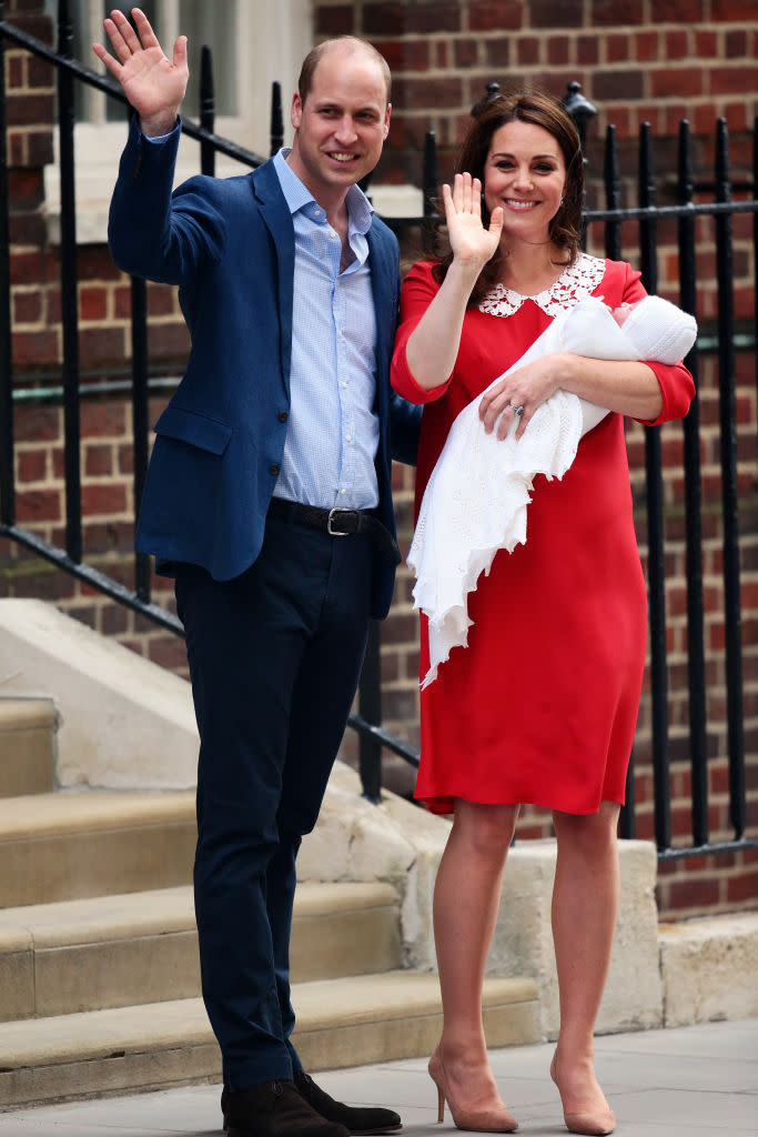 <p>For her third Lindo Wing exit, the Duchess of Cambridge chose yet another Jenny Packham dress. This time, she opted for a poppy red hue. <em>[Photo: Getty]</em> </p>