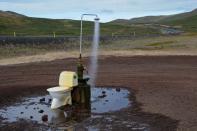 <p>An open-air toilet and a hot spring shower, near Lake Myvatn in northeastern Iceland. (Photo: Mariana Suarez/AFP/Getty Images) </p>