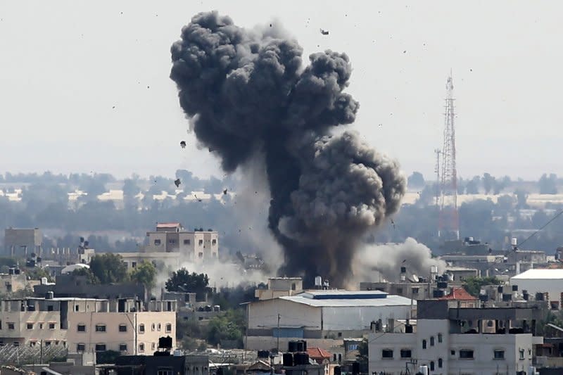 Smoke plumes after an explosion during Israeli bombardment in Rafah in the southern Gaza Strip on Wednesday. Photo by Ismail Muhammad/UPI