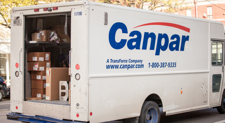 Canpar logo on a delivery truck in a street of Toronto, Ontario. Canpar, part of TFI international, is a Canadian courier specialized in parcels & letters shipping