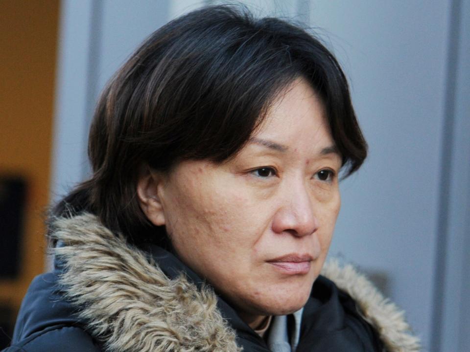 Xiaoning Sui leaves the federal courthouse after entering a plea in connection with a nationwide college admissions cheating scheme in Boston, Massachusetts, U.S., February 21, 2020..JPG