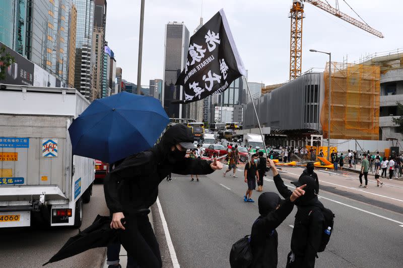 Anti-government protesters march against Beijing's plans to impose national security legislation in Hong Kong