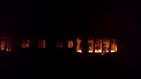 Fire is seen inside a Medecins Sans Frontieres (MSF) hospital building after an air strike in the city of Kunduz, Afghanistan in this October 3, 2015 MSF handout photo. REUTERS/Medecins Sans Frontieres/Handout via Reuters