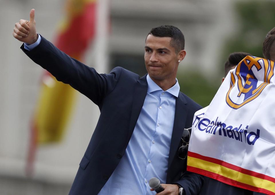 <p>Ronaldo gives a thumbs up to supporters. </p>